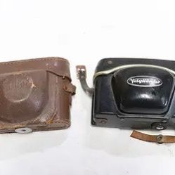 2 cameras; Voigtlander Bessa AS, and a Komilette 35 camera