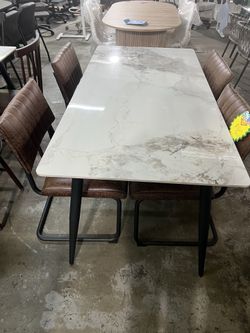 Brand new 5 pcs of set, Sintered Stone Dining Table: 63 Inch Grey Kitchen Table with Metal Legs ,with 4 chairs  $350  Warehouse Address: 2745 Boone st