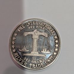 The International Trade Unit .999 Fine Silver Coin 