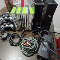 Two Xbox 360 consoles, remotes and games