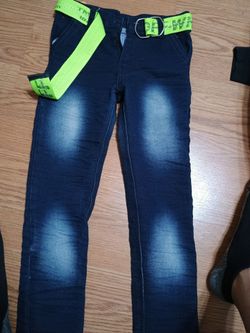Stylish kids denim rugged blue jeans with a bright green belt.
Never worn. With tags. Waist 24", Length 24"
Union hills and 20th Street