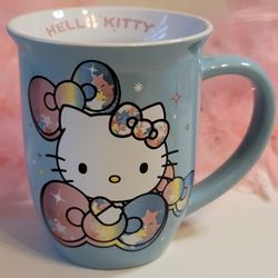 Hello Kitty Blue Coffee Mug Cup Starshine Bows Silver Buffalo Rainbow 16 oz 