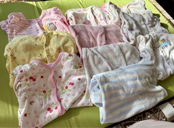 Like New set of 10 cotton material-baby pajamas in size 3 to 9 months old