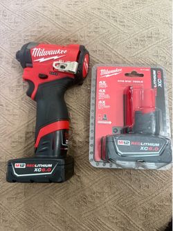 Milwaukee 1/4” (6mm)HEX IMPACT DRIVER with 2 batteries M12” 6-0.. BRAND New.. $300
