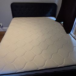 Full mattress and black full bed frame