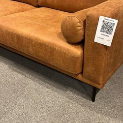 Telora Caramel Sofa
Ashley Furniture$10 Down Payment And Financing Available