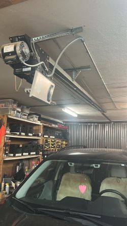 Garage Door Opener Broken Spring Off Track Adjustment Replace And Parts