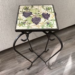 Foldable Wrough iron table with ceramic top 25” tall brand new $20 price is firm