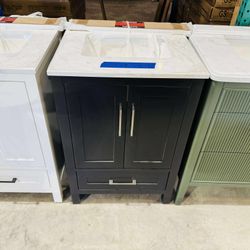 24 in Single Sink Bath Vanity in Black with Vanity Top in White  $349 