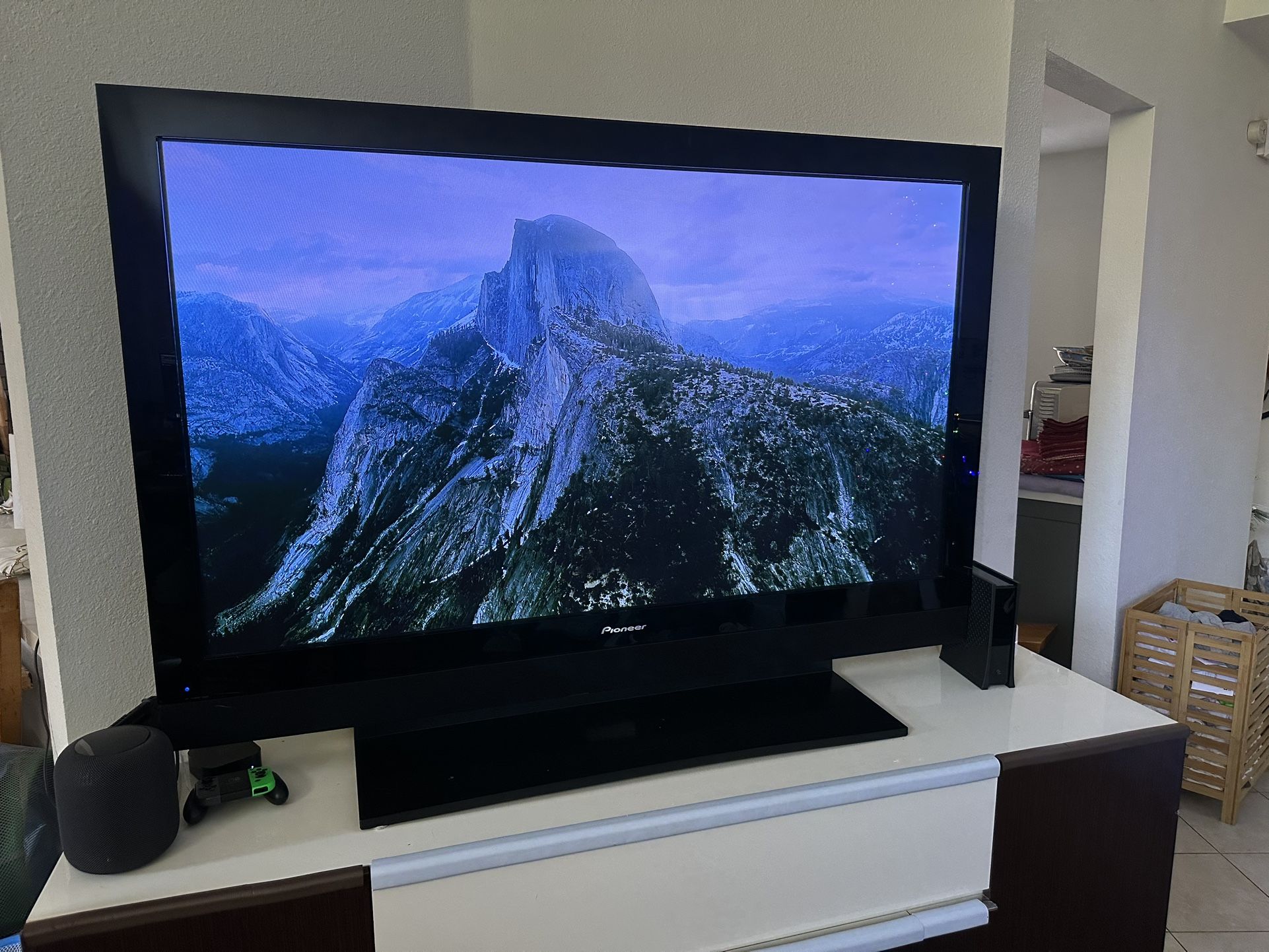 Pioneer 60” Plasma, with sound bar, remote, base stand and wall mount