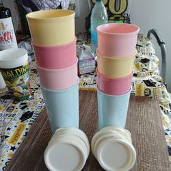 Tupperware cups  4 cups of 12 oz and 4 cups of  16 oz