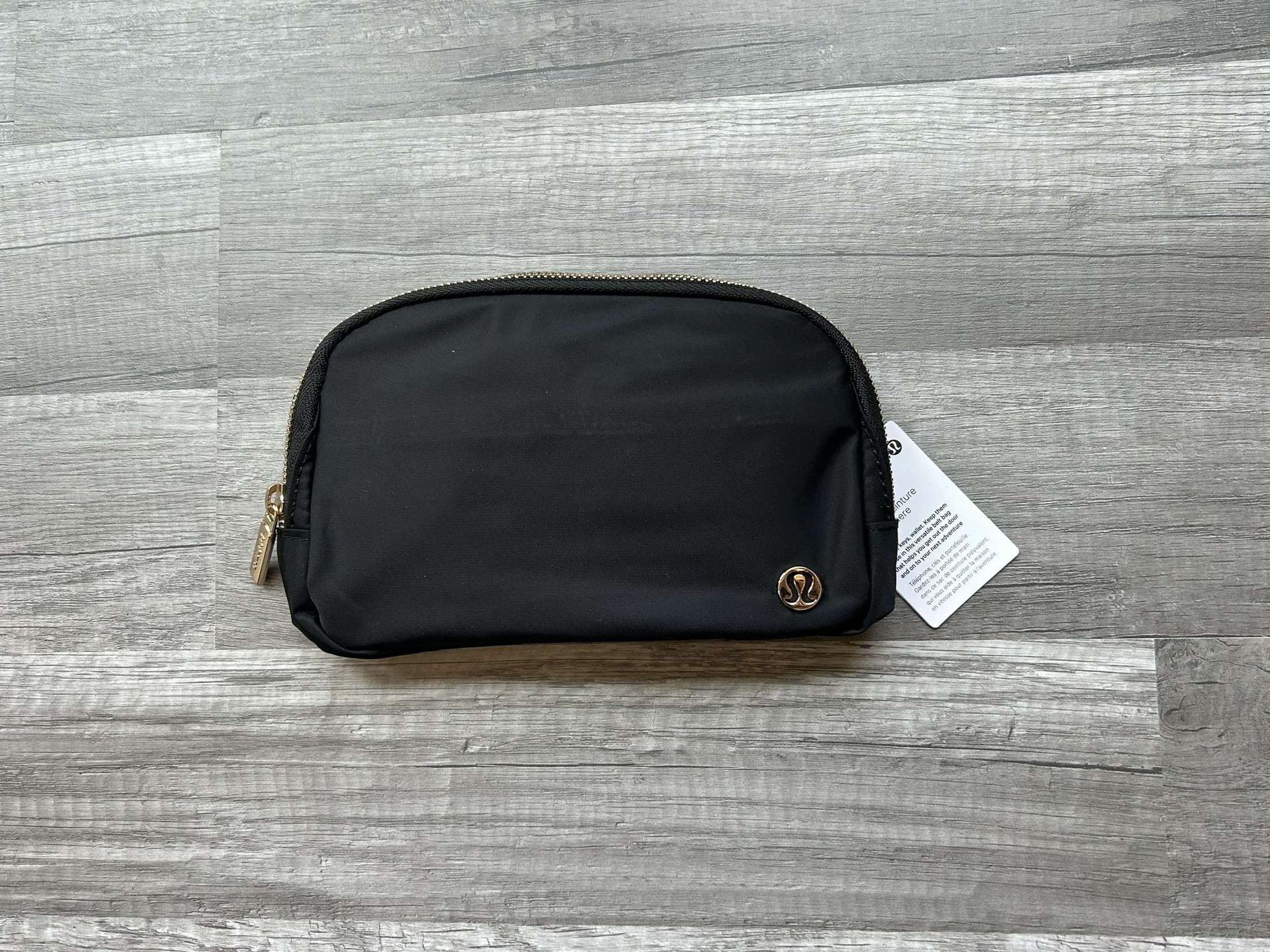 Lululemon Everywhere Belt Bag Black and Gold Wordmark New With Tags 1L