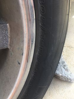 Four rims with used tires