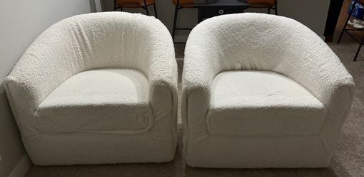 Reupholstered swivel chairs in sherpa fabric (originally red leather)