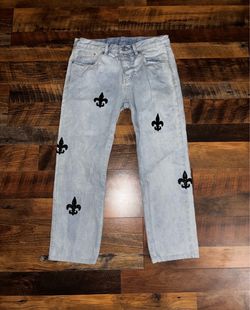 Black fleur-de-lis embroidered jeans Size: 34” 100% Cotton