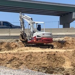Skidsteer Or Mini excavator 