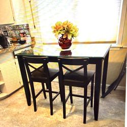 Classy black high top table with two chair chairs