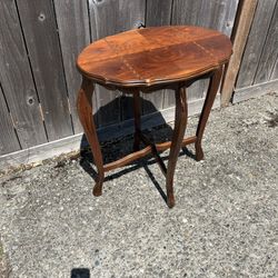 Antique Mahogany Oval With Carved Features Side Table