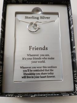 Sterling silver necklace and pendant.