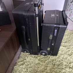 2 Porter Cases.  Luggage Hard Camera Cases Rolling Vintage Travel Carry On 22x14x8 large and small. As is. Pick up or deliver. 