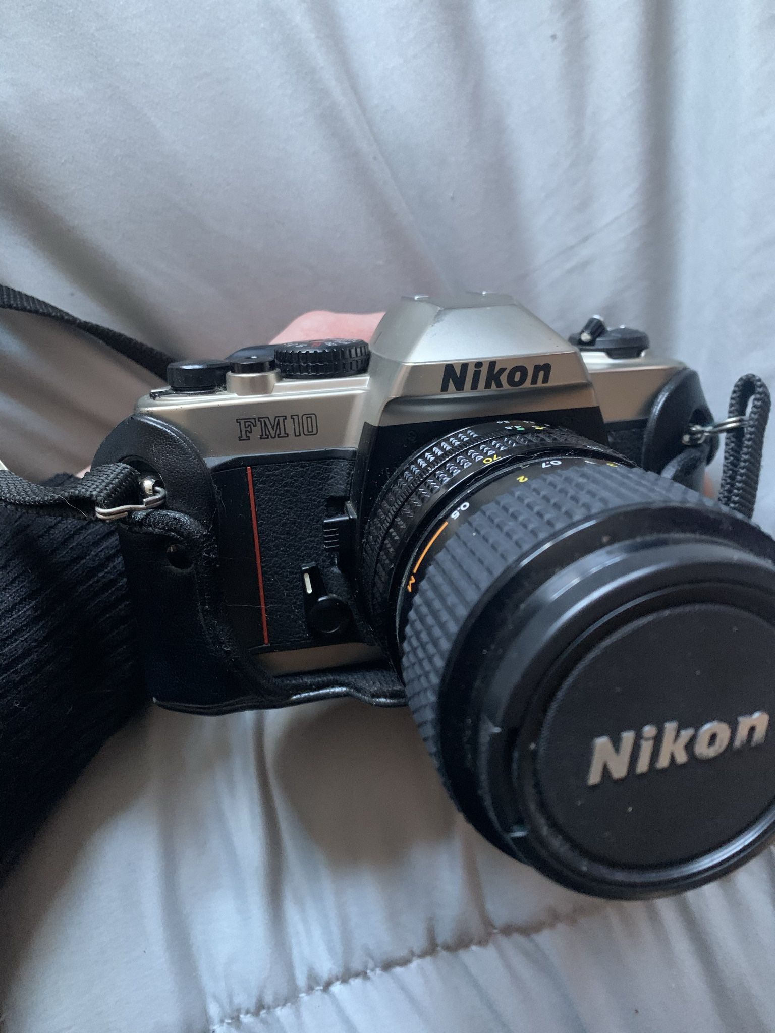 Older Nikon FM10 Camera with Lense