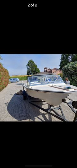 21’ Boat With in Board Out Board Mercury
