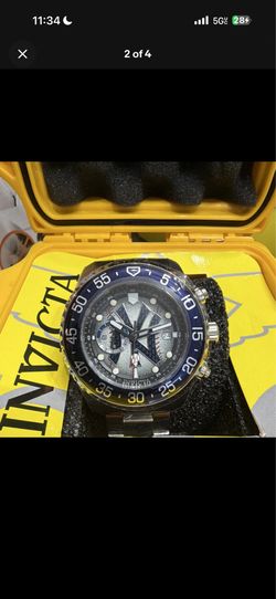 Invicta Men’s Quartz Chronograph ny Yankees Dial Blue Bezel SS Bracelet 100m Box