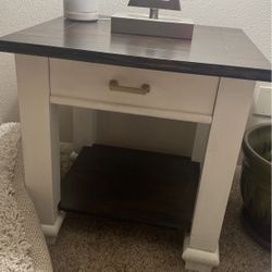Two end tables and one coffee table