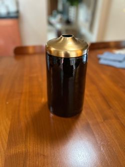 Black and gold vase