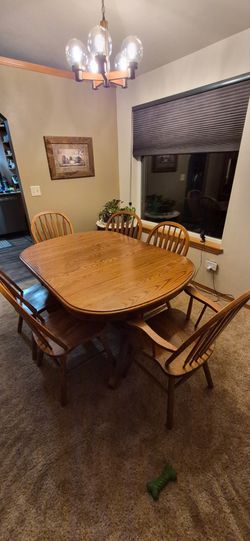 Oak dining set with six chairs