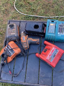 Random Battery Chargers And Drill And Saw For Everything