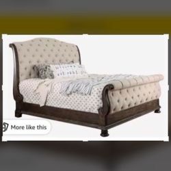Beautiful King Size Bed  Frame king.  Mattress In Picture Not Included But I Do Have One Available If Interested.