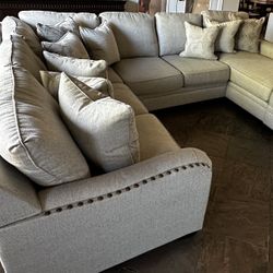 Sectional Beige Nailhead Trim with Chaise Ottoman