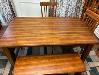 Ashley dining table with 3 chairs,oak color