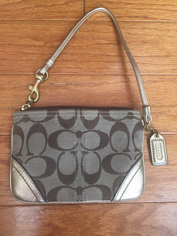 Coach gold wristlet