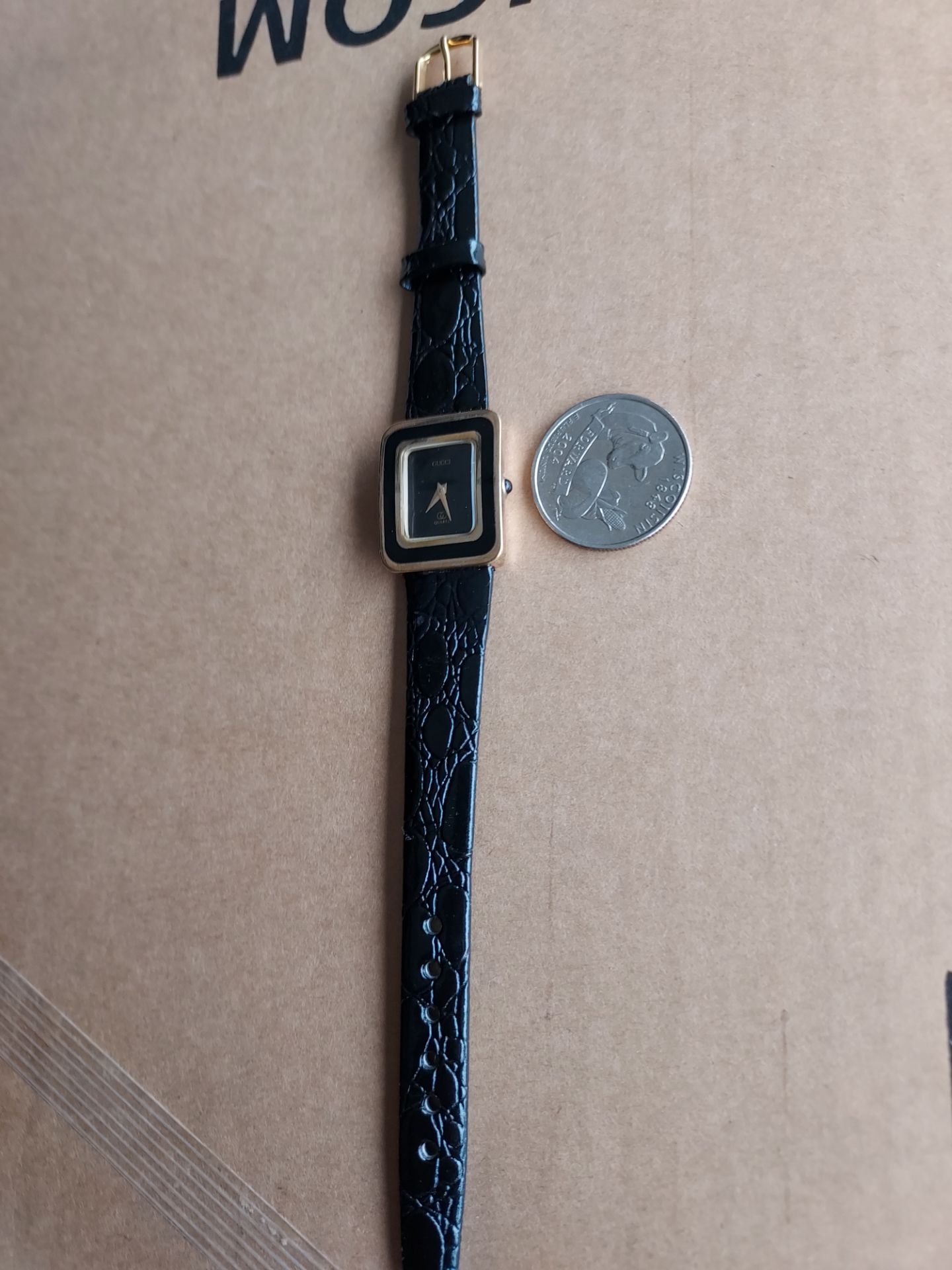 Beautiful Rectangular woman's watch working.