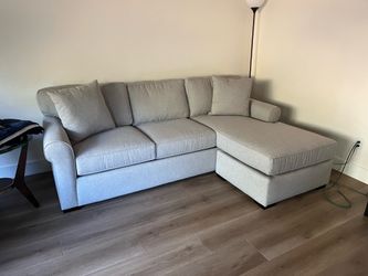 Brand New Living Spaces  Cypress Roll Arm Reversible Sofa Chaise