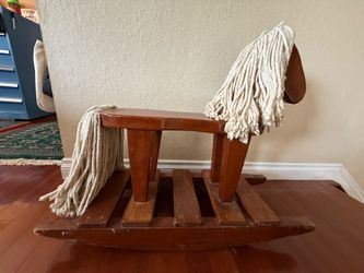 Antique wooden rocking horse