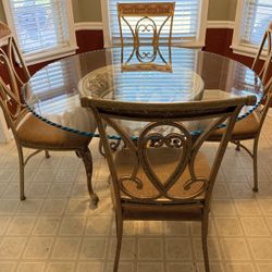 For Sale: Elegant Glass‑Top Dining Table & 4 Ornate Metal Chairs – Great Condition