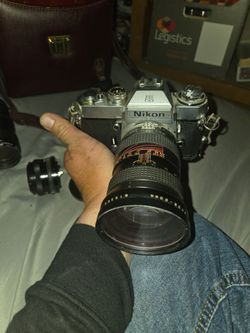 Vintage Nikon camara plus bag and contents of bag