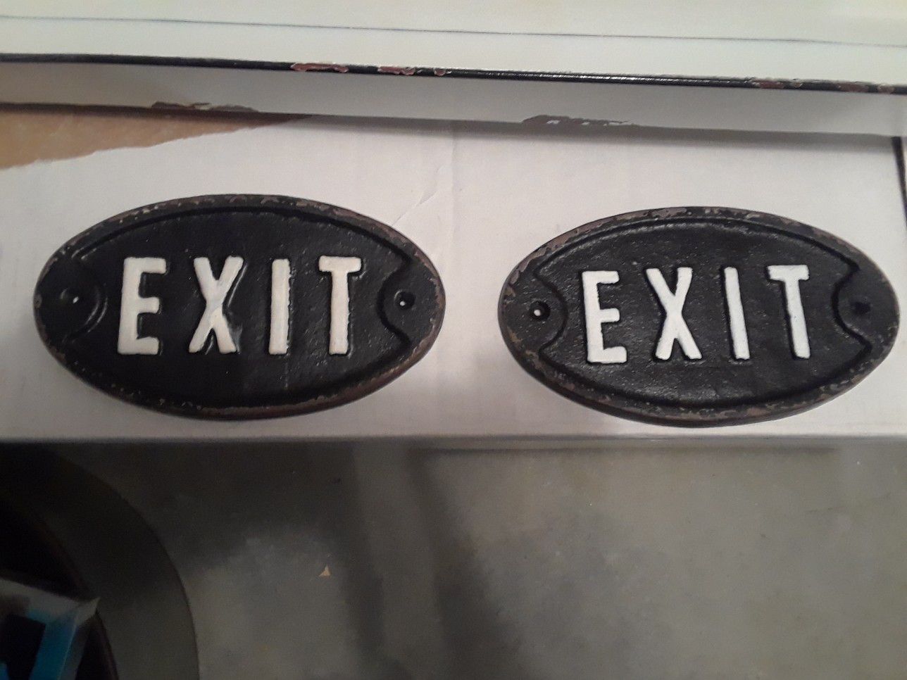 Heavy Exit signs