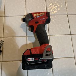 Like new Milwaukee M18 impact drill and Red battery