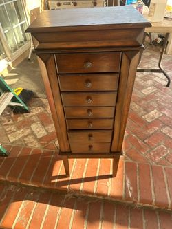 Standing jewelry armoire cabinet
