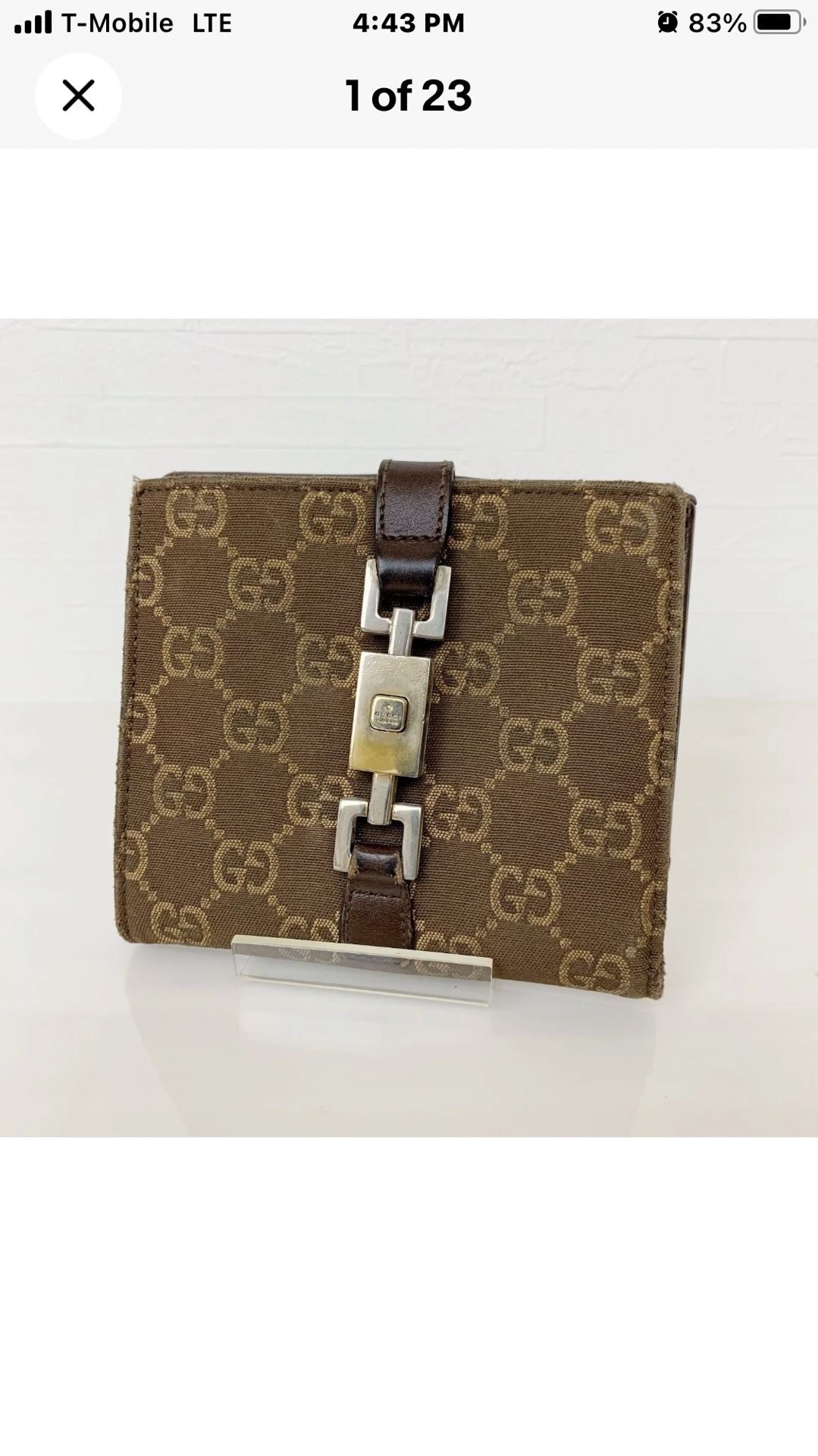 Beautiful Authentic GUCCI Canvas and leather bifold wallet GG pattern with lock used