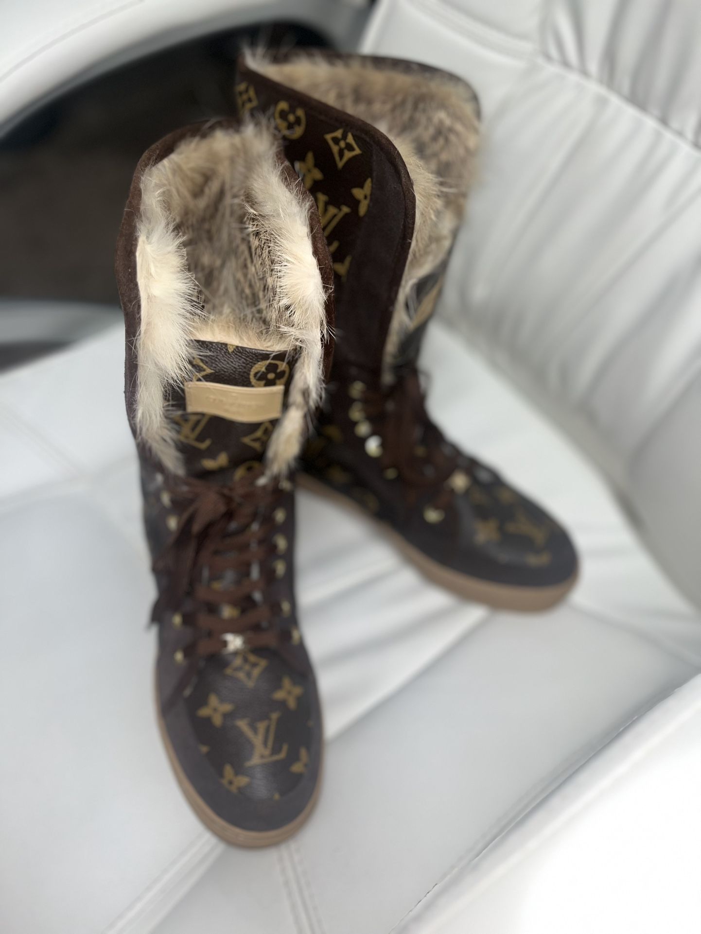 LV boots w/ Fur Throughout The Entire Lining Of The Lace up Boots.