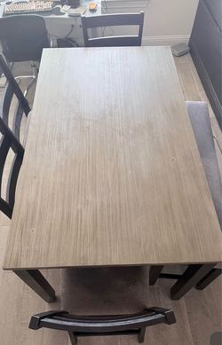 Dining table with chairs and bench