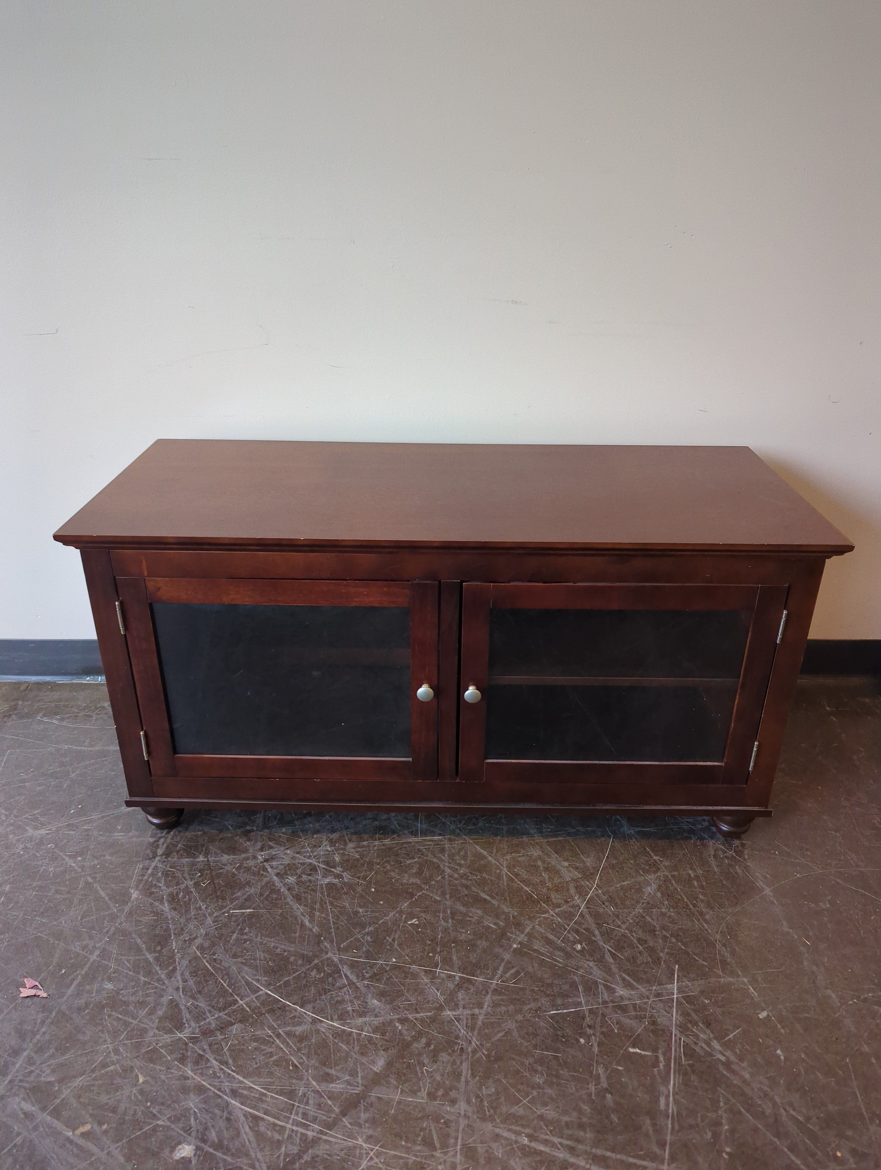 Reddish-Brown Wood Media Console with Glass Doors