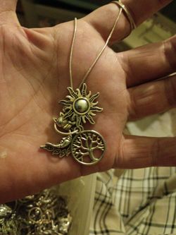 Charm necklace with few charms in perfect condition