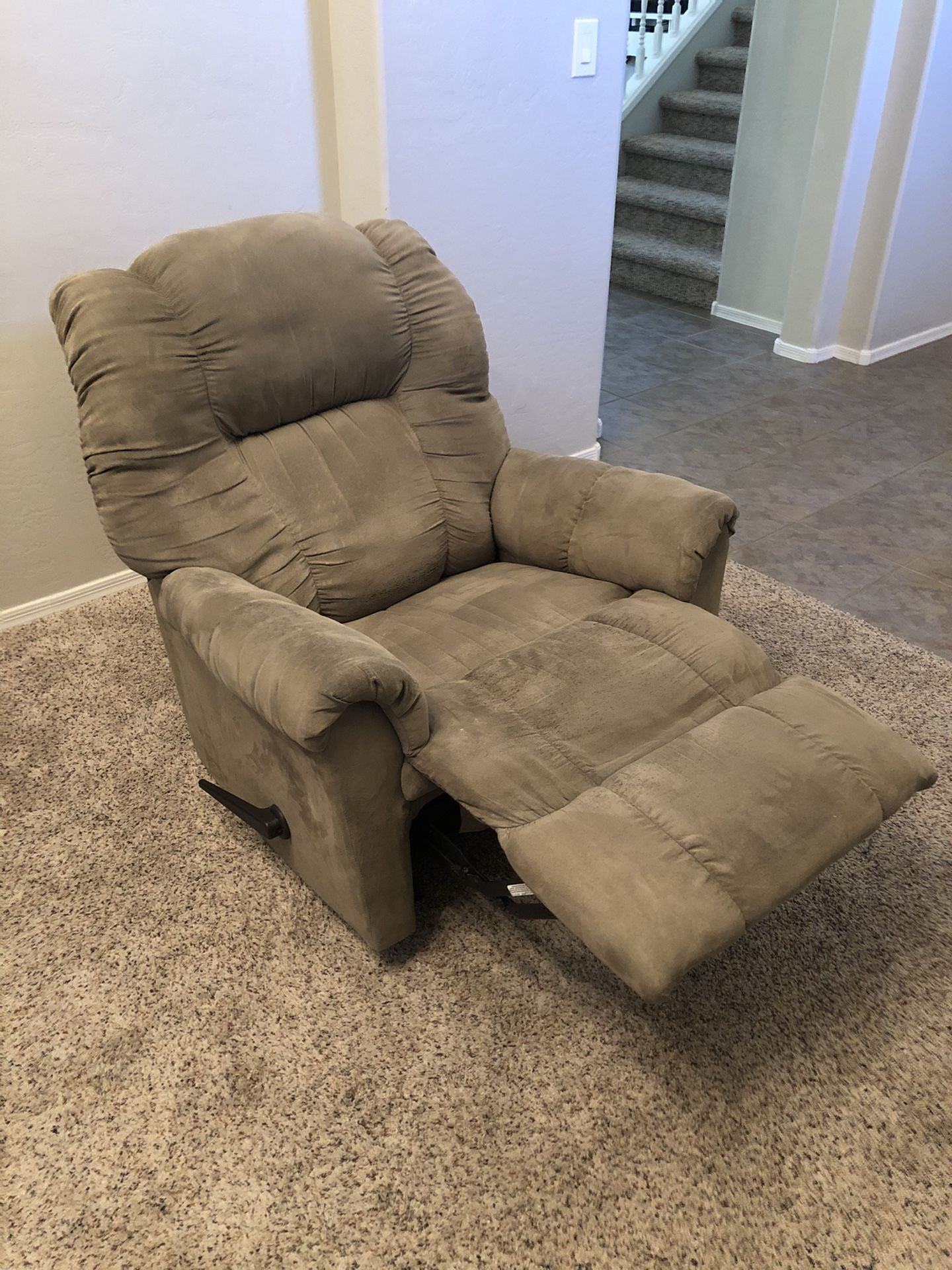 Beige recliner rocking chair