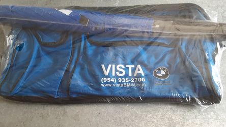 Duffle bag and umbrella